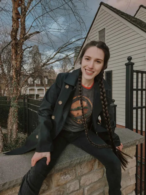Emily from the College Bookcore team in the Nona Shirt
