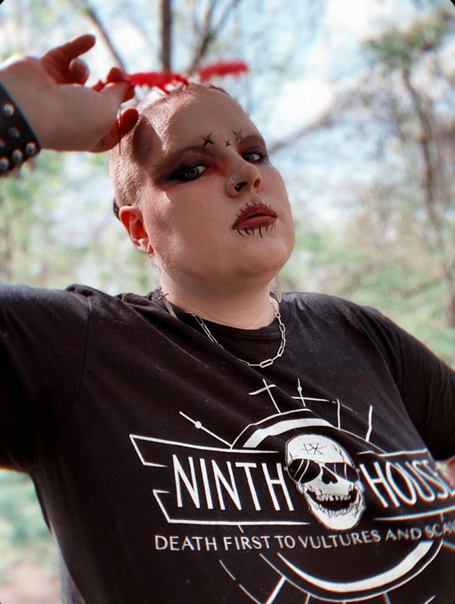 Gideon the ninth themed ninth house shirt in black with skull and the phrase "death first to vultures and scavengers" styled in ninth house fashion