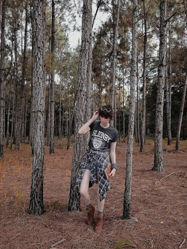 Aglionby shirt in heathered grey modeled in forest full body photo
