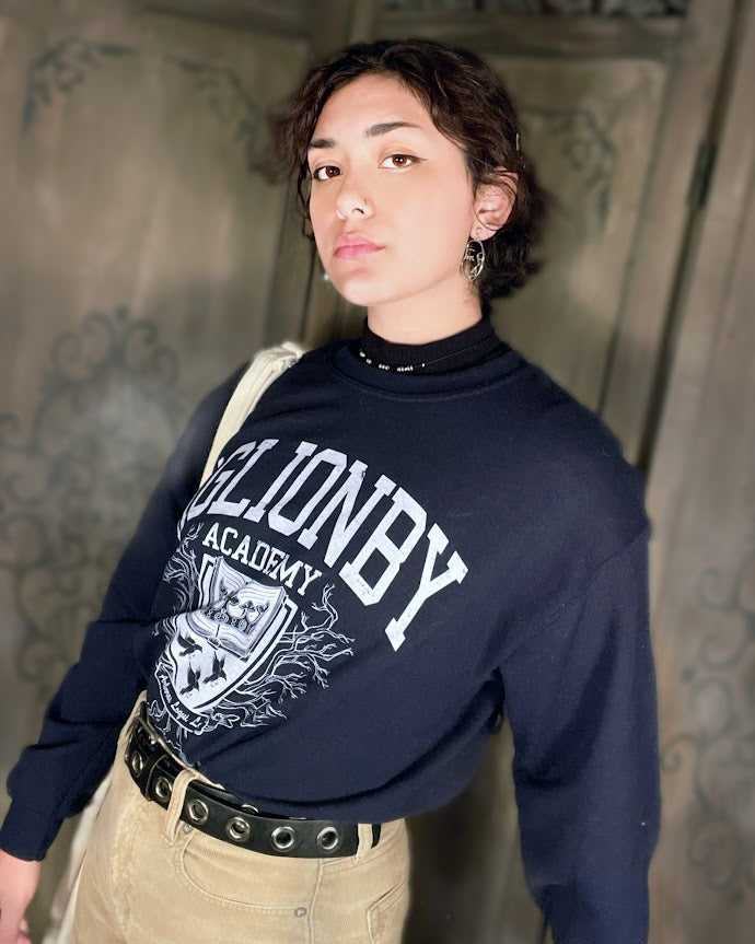 Aglionby sweatshirt in navy modeled by blue