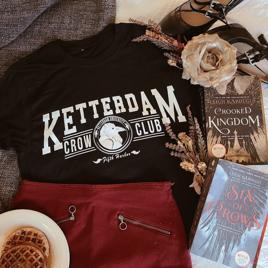 Ketterdam crow club university with crow logo shirt flatlay