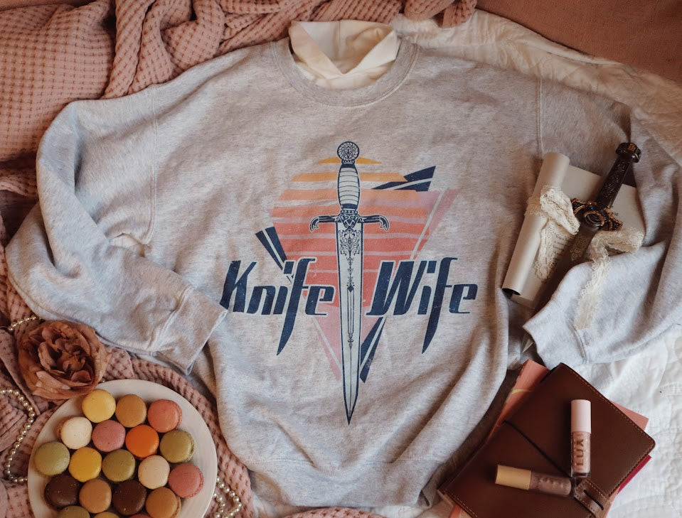 Knife Wife sweatshirt in an 80s style print. Styled with the cruel prince books and with a jude Duarte dagger