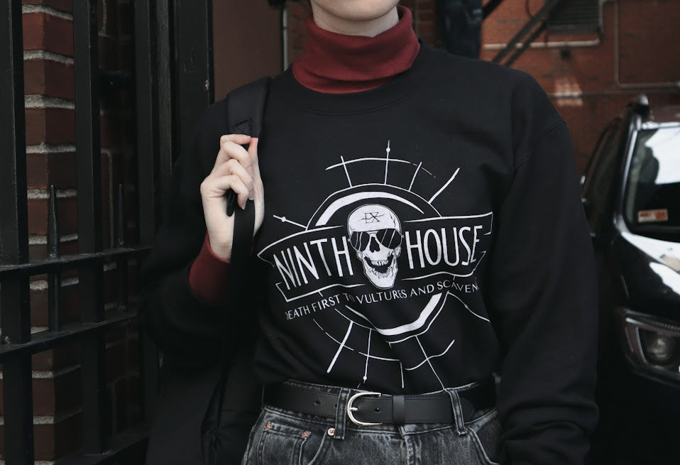 Gideon the ninth themed ninth house sweatshirt in black with skull and the phrase "death first to vultures and scavengers" 